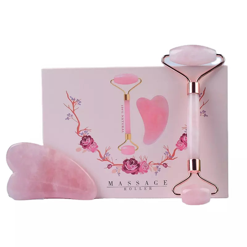Rose quartz face roller and gua sha stone set by BeautyNomix in a decorative box with floral design.