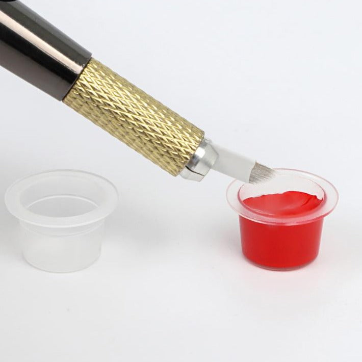 Clear sterile tattoo ink cups in a pack of 20 by Face Deep, designed for pigment application.