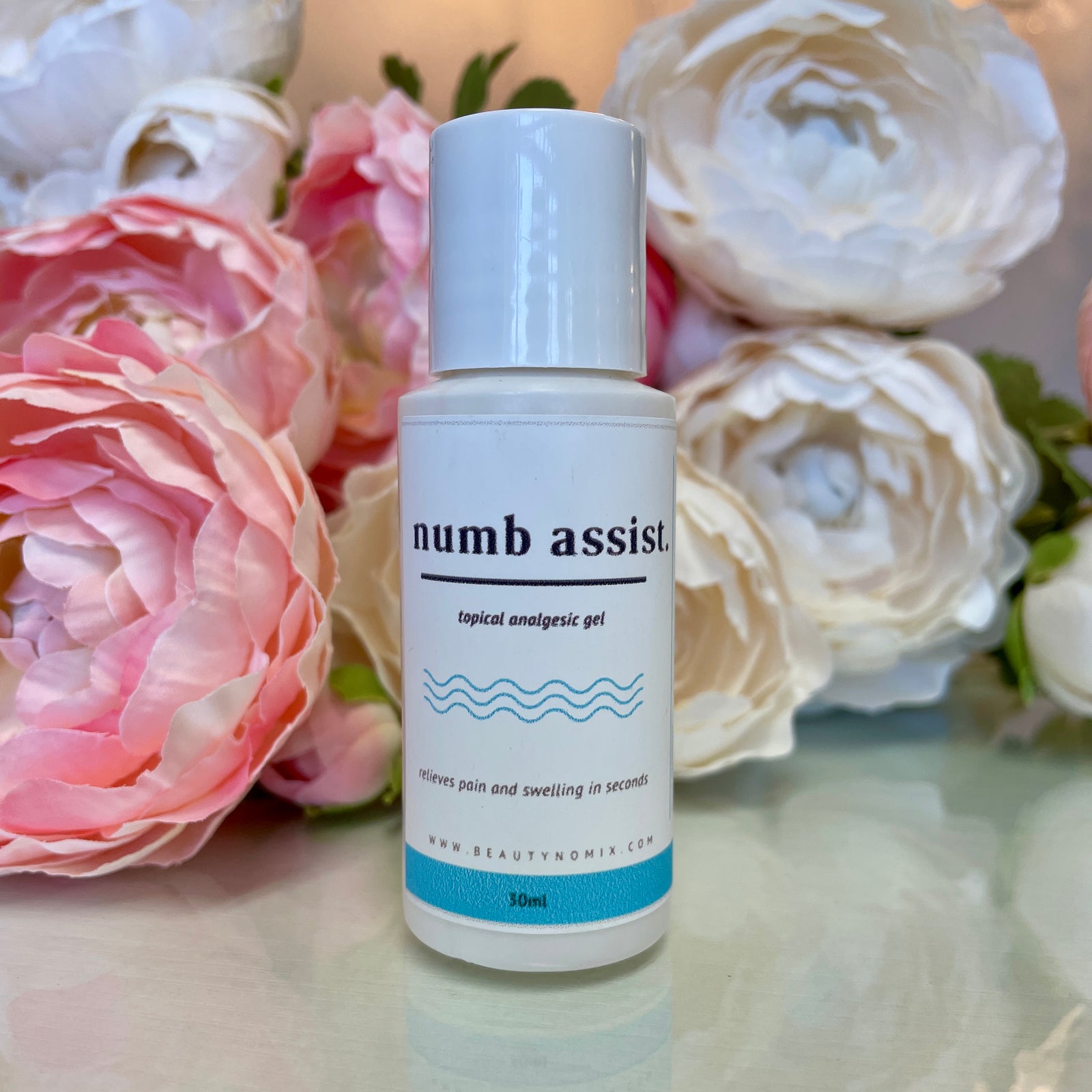 BeautyNomix Numb Assist topical anesthetic numbing gel in a 1 oz bottle, clear gel formula