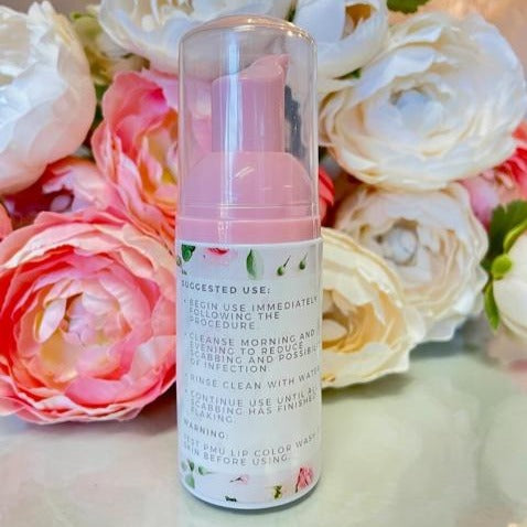 BEAUTYNOMIX PMU Lip Wash Gentle Foaming Cleanser in a sleek white bottle with a pump dispenser