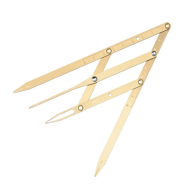 Gold eyebrow measuring caliper by BeautyNomix, ideal for microblading and travel, featuring precise measurement markings.